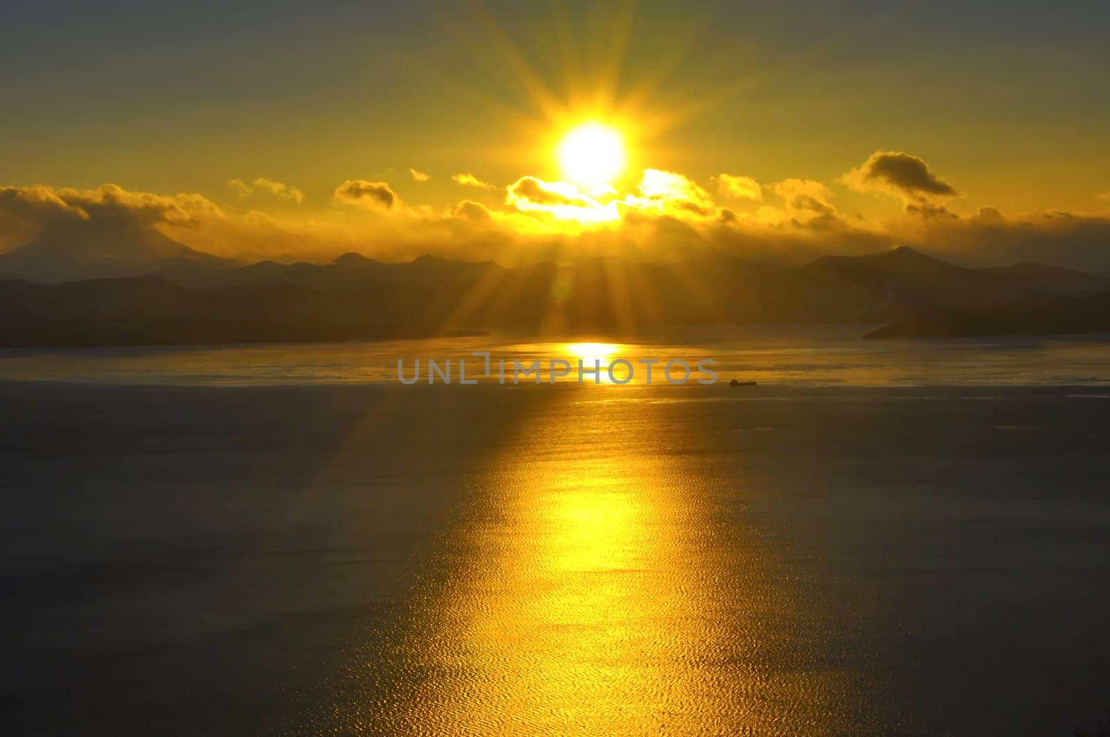 Decline over silent ocean at coast kamchatka