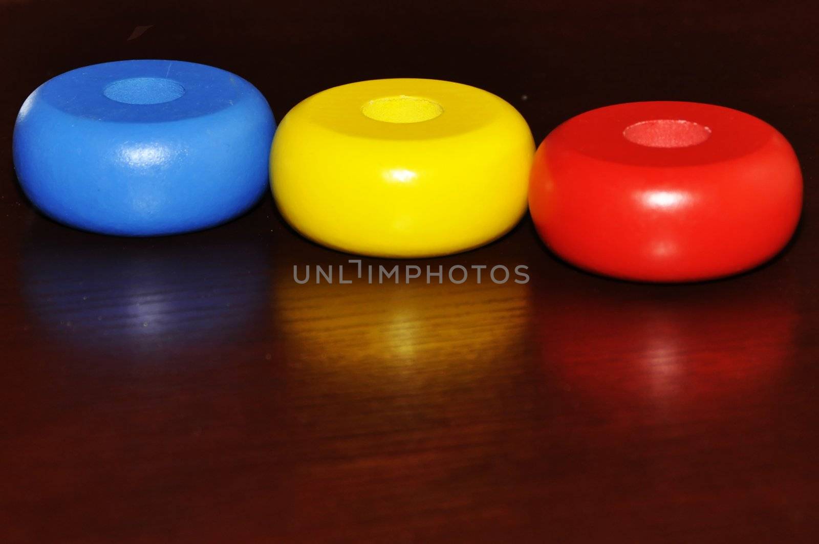 The colour subjects on a wooden surface