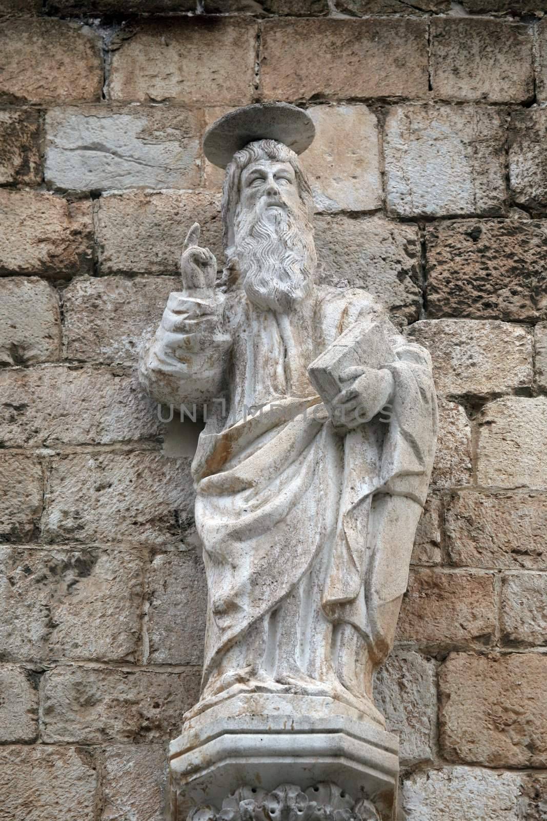 Statue of God the Father on the portal of the Franciscan church of the Friars Minor in Dubrovnik