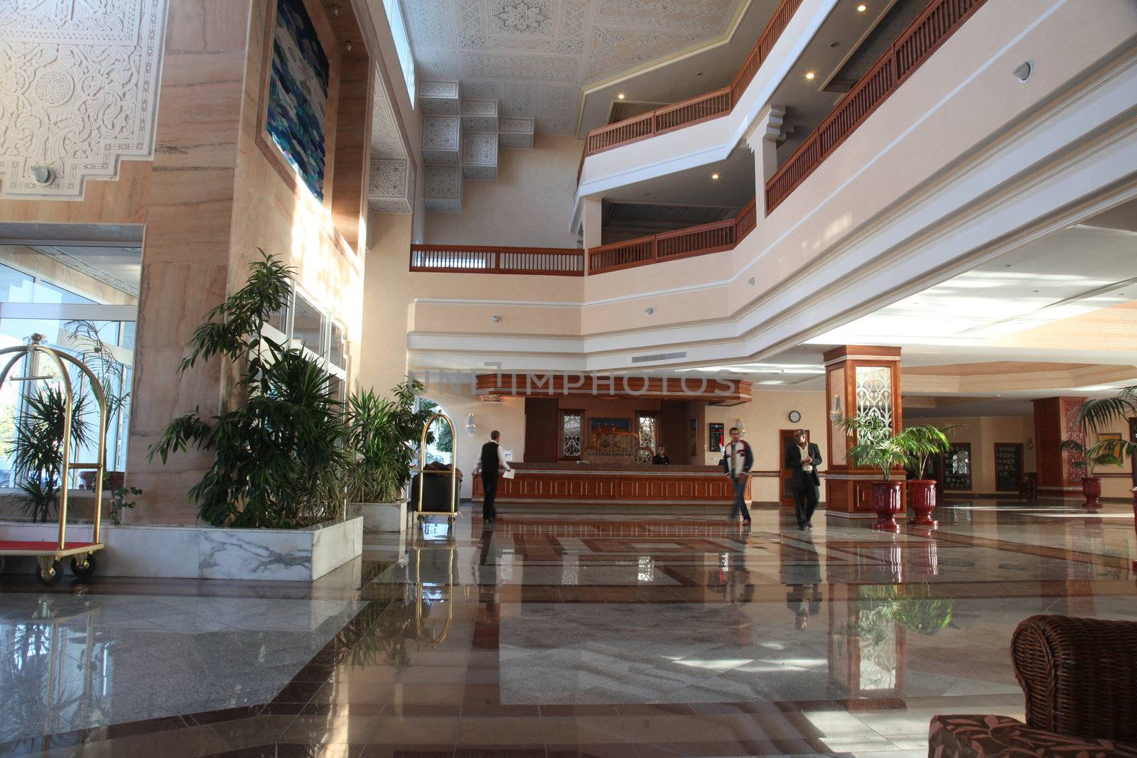 Modern hotel lobby with marble floor