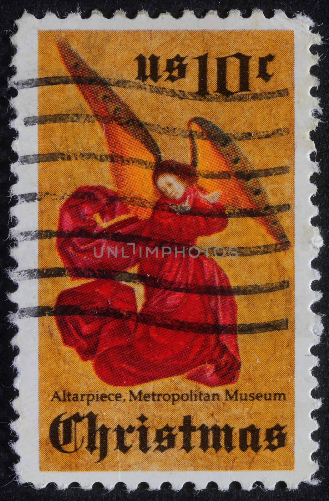 UNITED STATES OF AMERICA - CIRCA 1980: A greeting Christmas stamp printed in USA showing angel