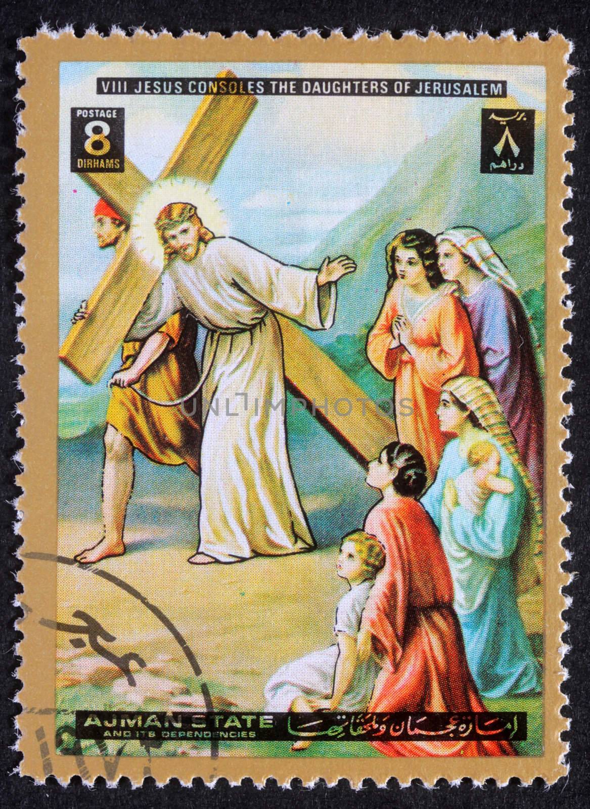 AJMAN - CIRCA 1980: Stamp printed in Ajman shows 8th Stations of the Cross