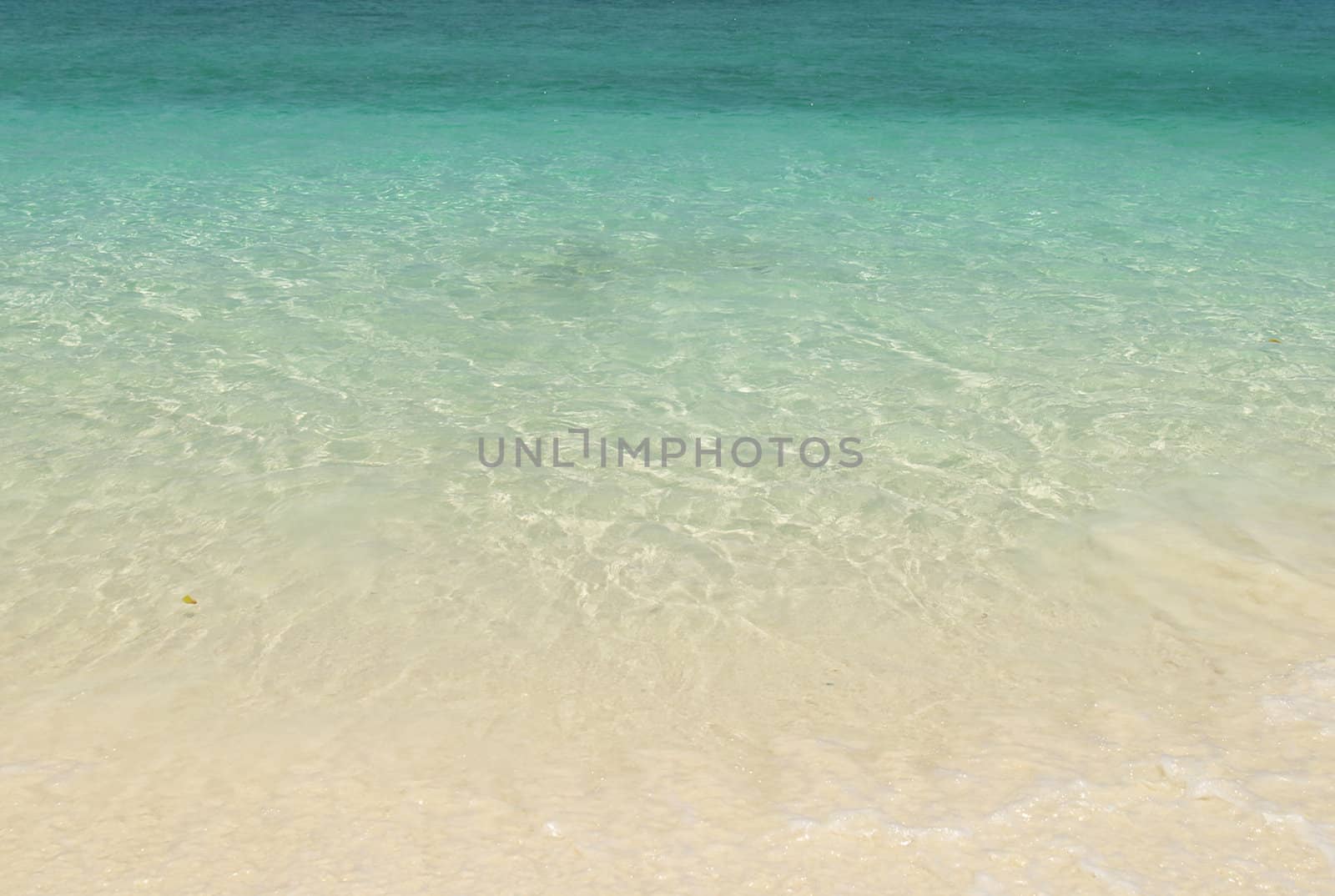 Boat on the calm blue sea