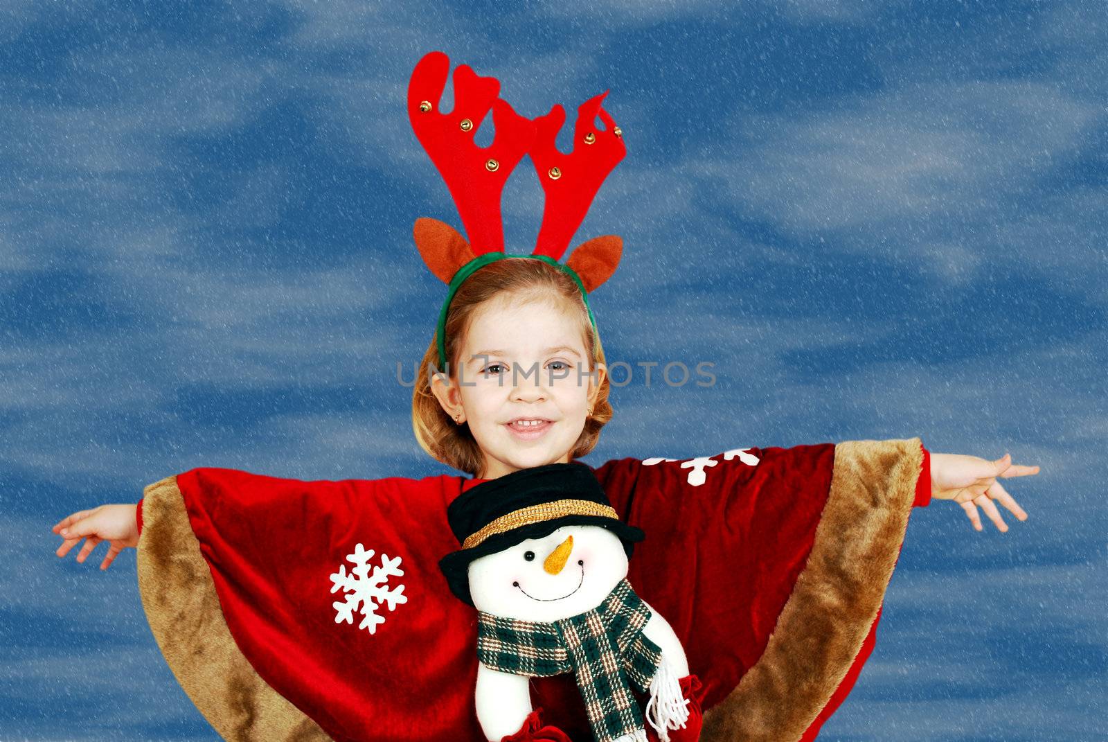 beautiful little girl with deer Rudolf horn on head