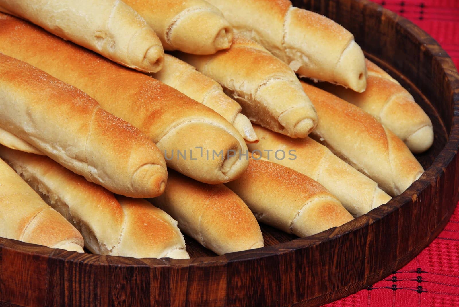 heap of appetizing homemade bread rolled loafs