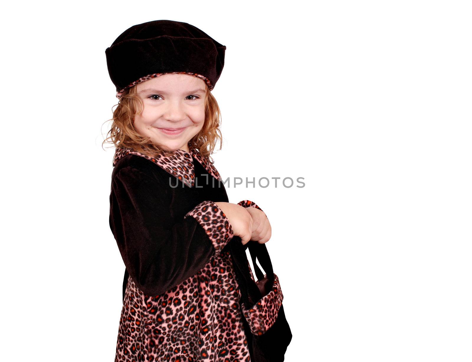 little girl in a dress with a leopard design