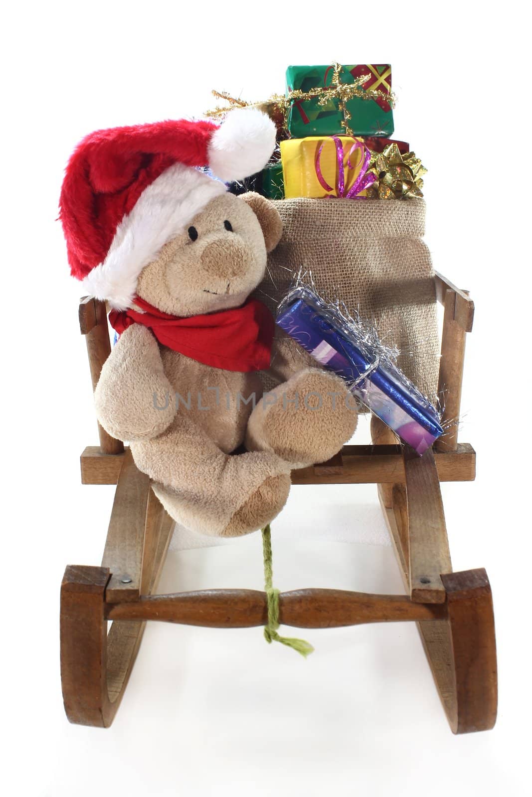 a teddy bear with colorful Christmas presents