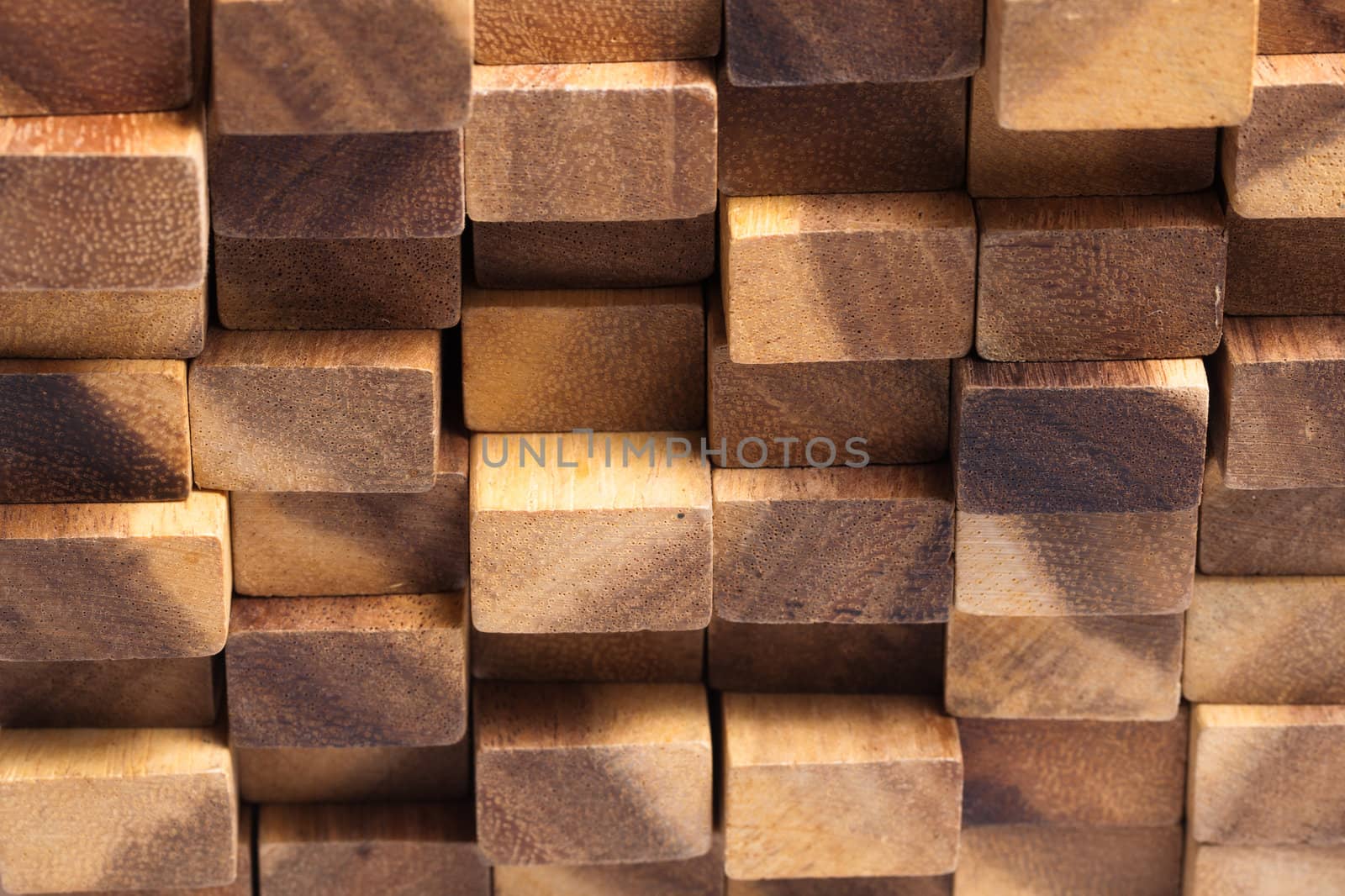 Stack of wood by Suriyaphoto