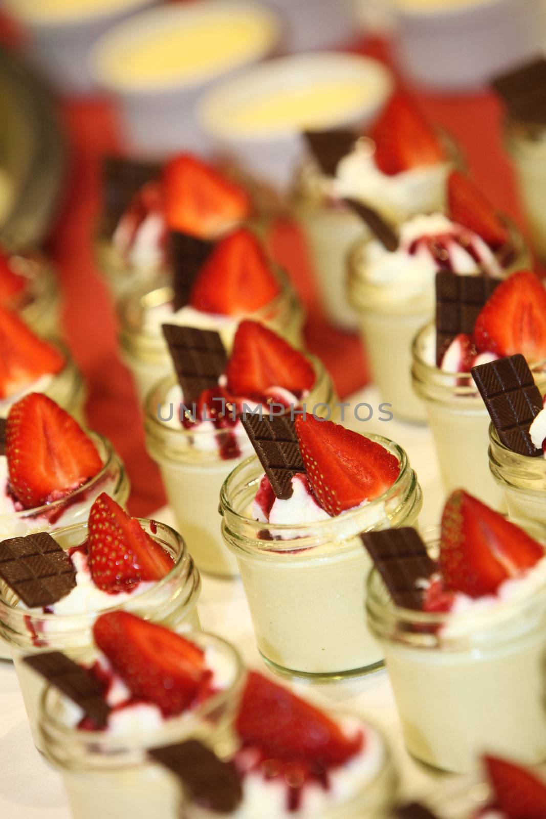 Sweet dessert with strawberries and chocolate - Many small bowl, close up