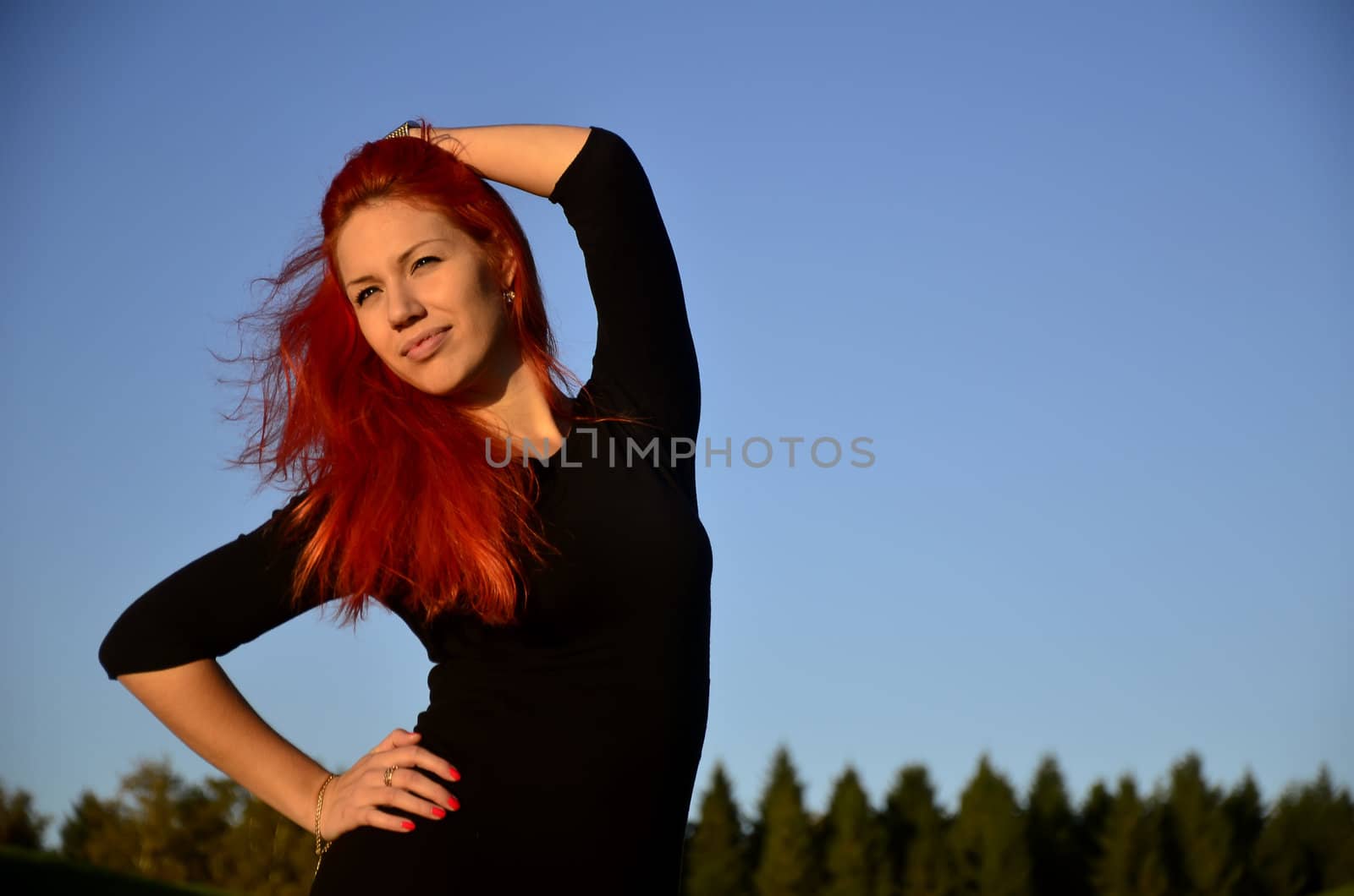 Redhead girl posing