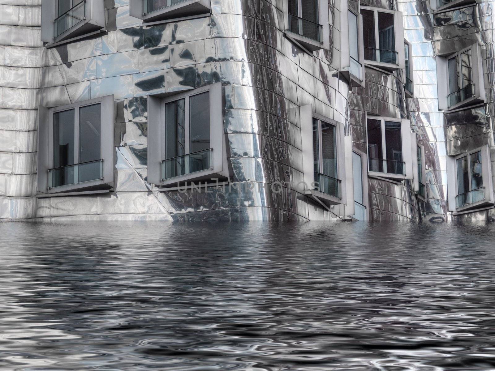 Modern metallic building flooded in water with ripples