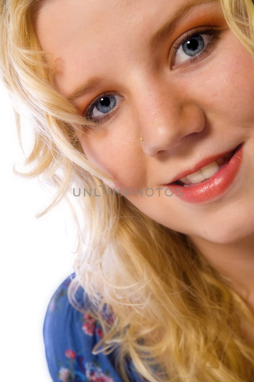 Studio portrait of a blond young lady looking average