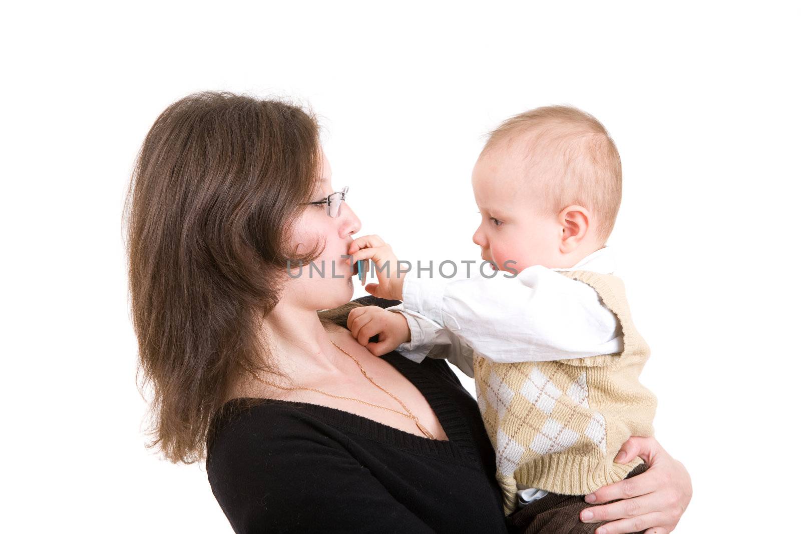 small boy gives dummy to his mum