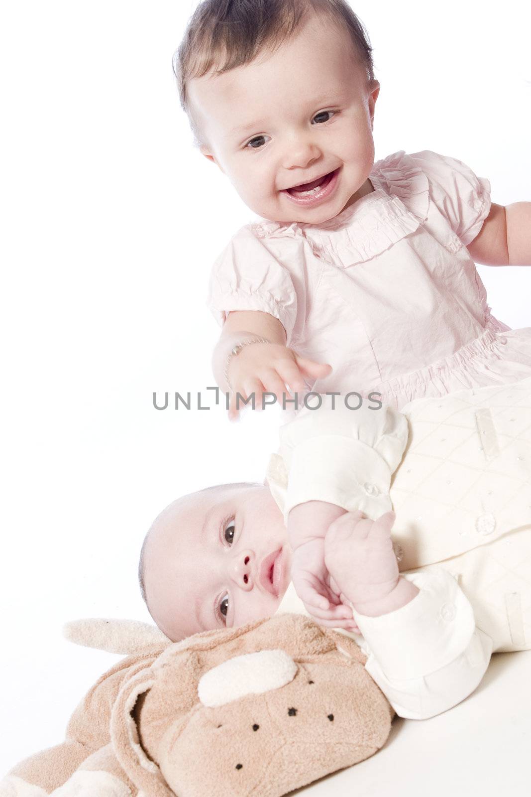 little children portraits taken in the studio on a white background