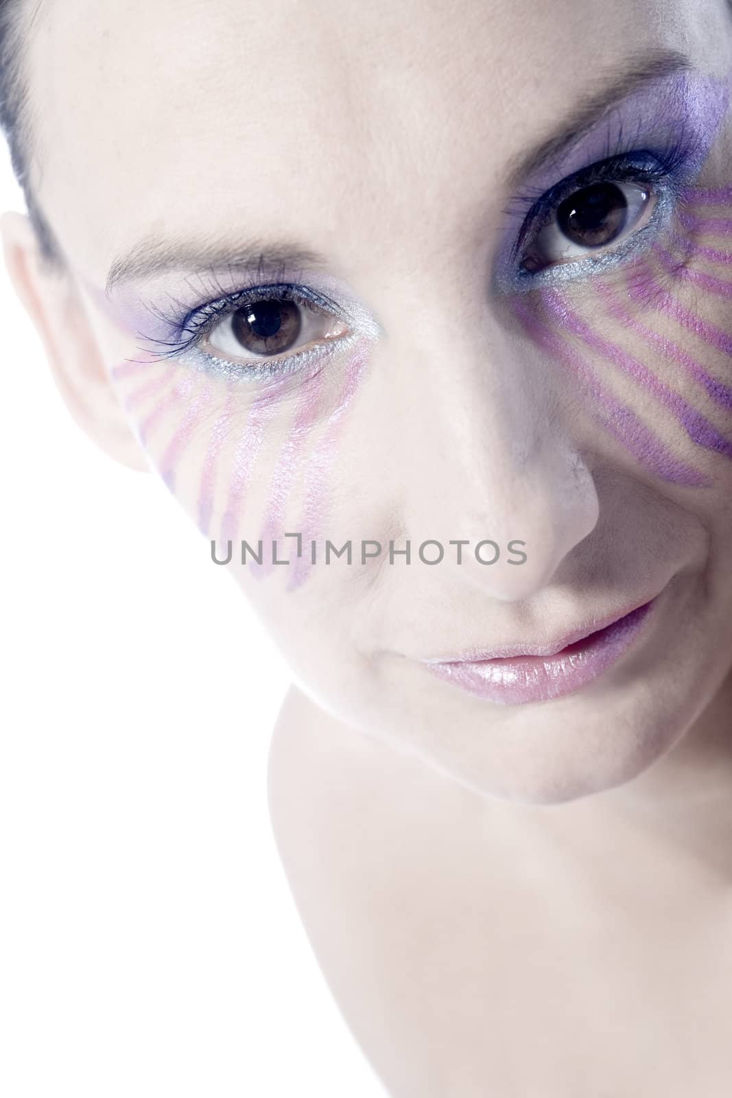 Studio portrait of a mature woman with extreme make-up