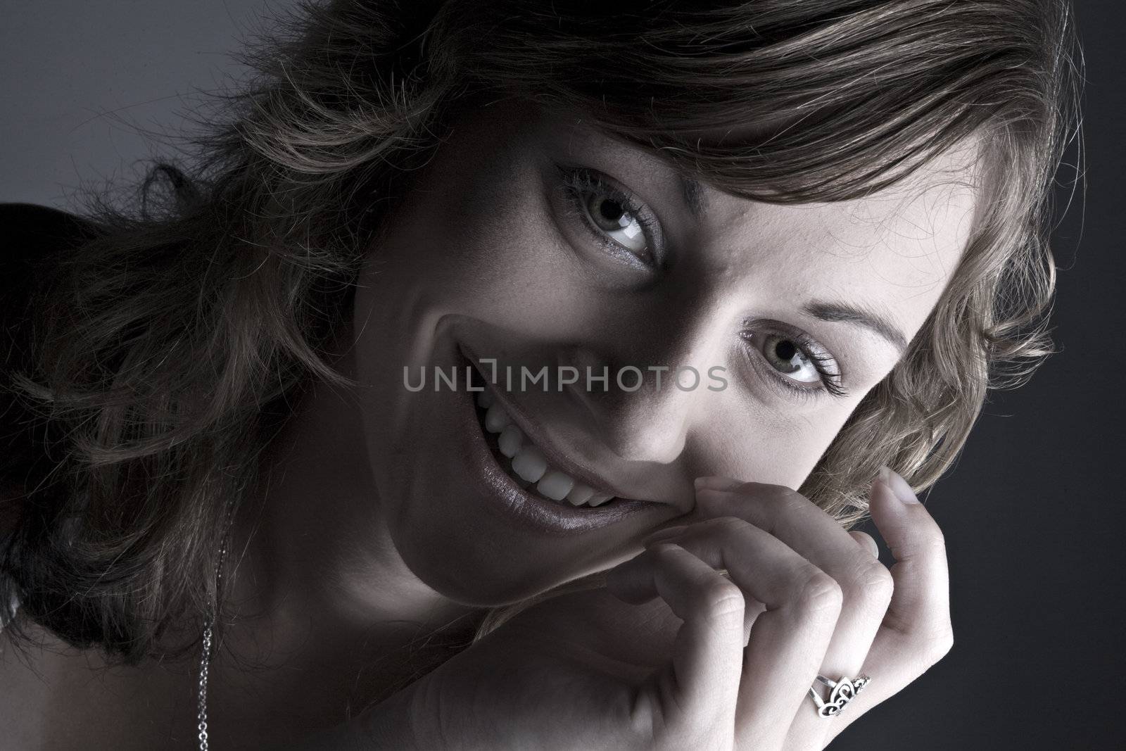 Studio portrait of a teenage model smiling