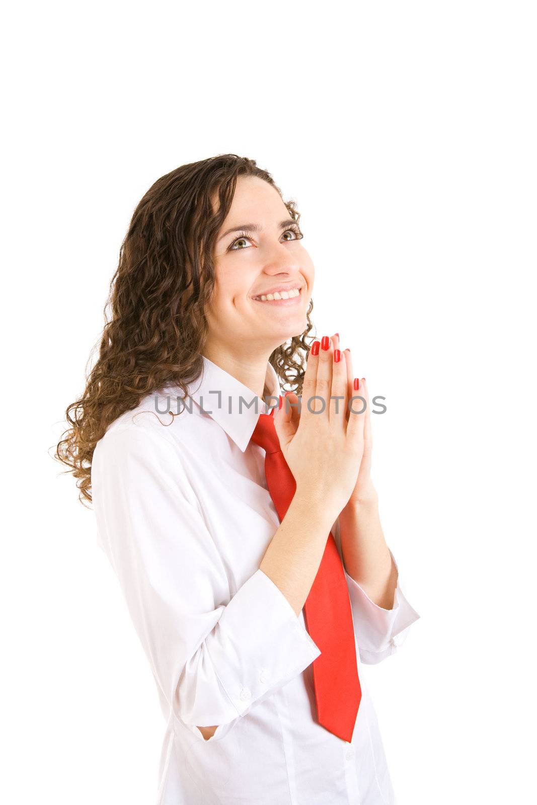 happy businesswoman with pleasure lifts joyful eyes to the sky and hands to the breast