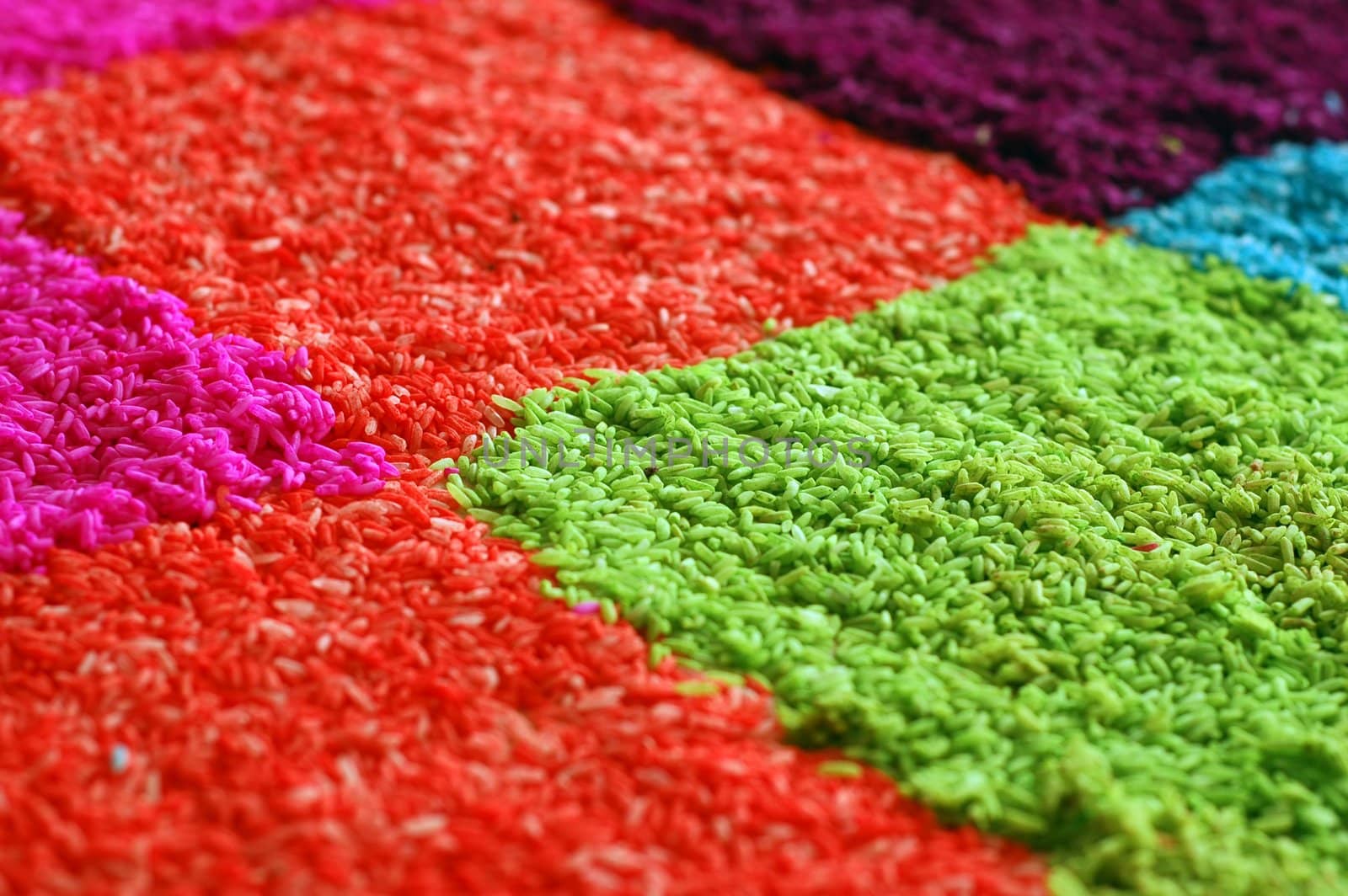 Indian colorful rice art of decorating during worship festival. Usually on ground or floor.