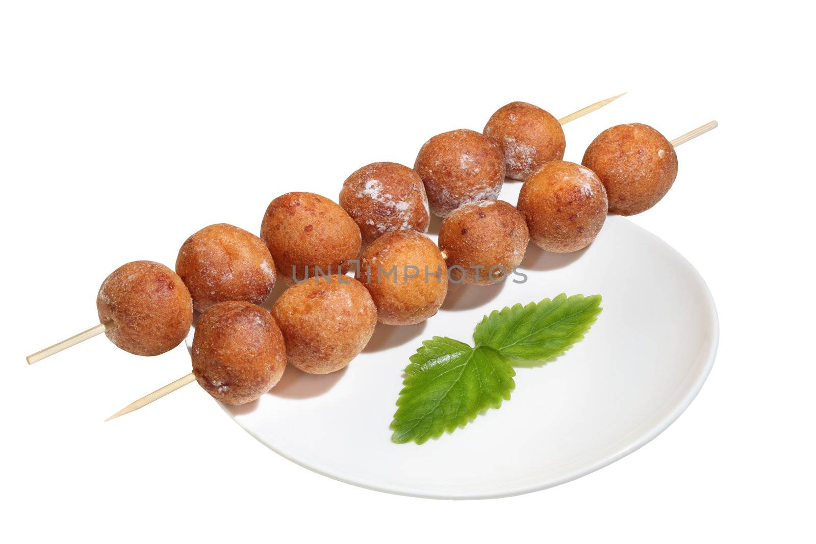 isolated doughnuts balls on stick