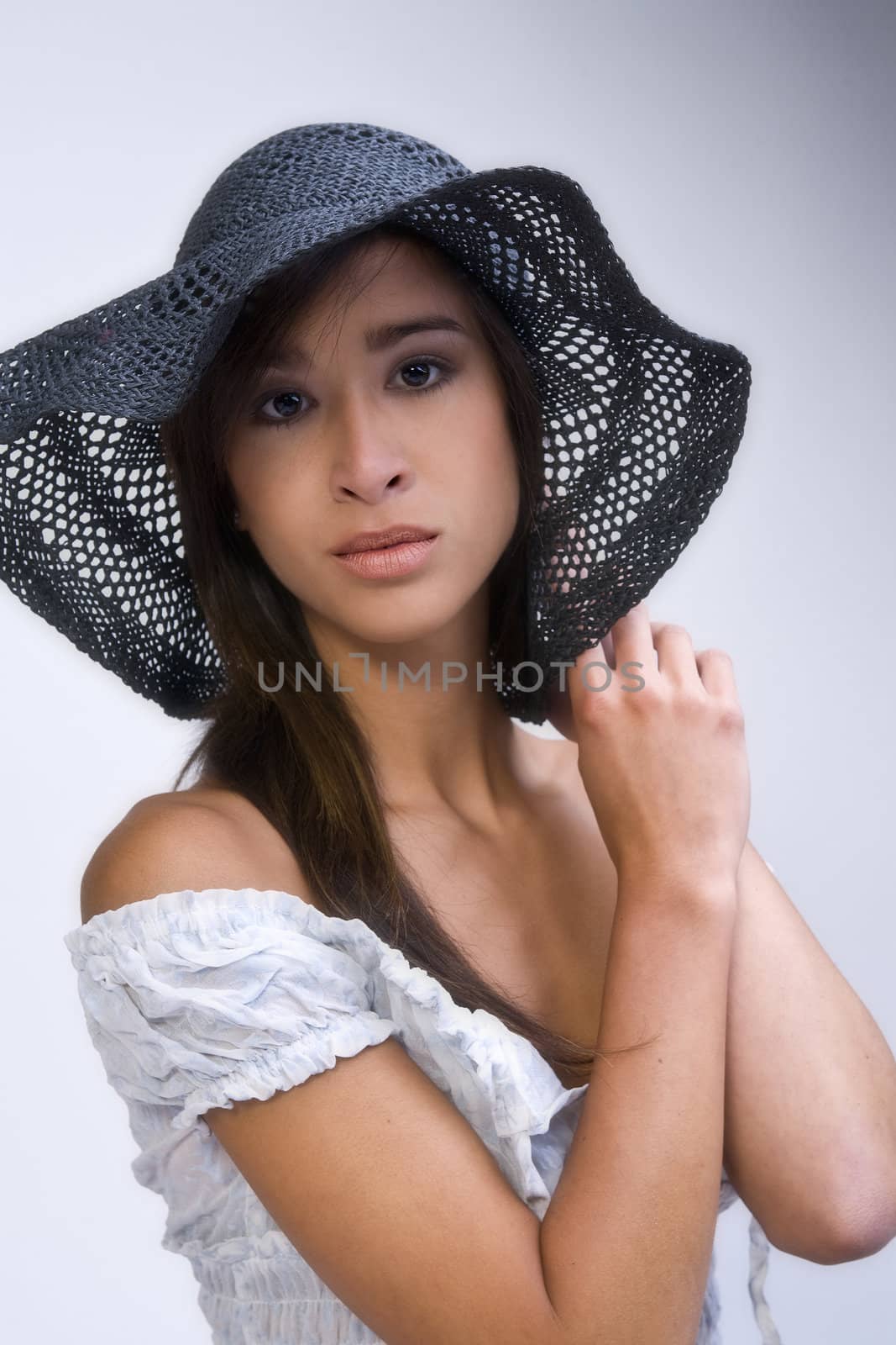 Studio portrait of a beautiful mixed race, vietnamese girl looking like summer