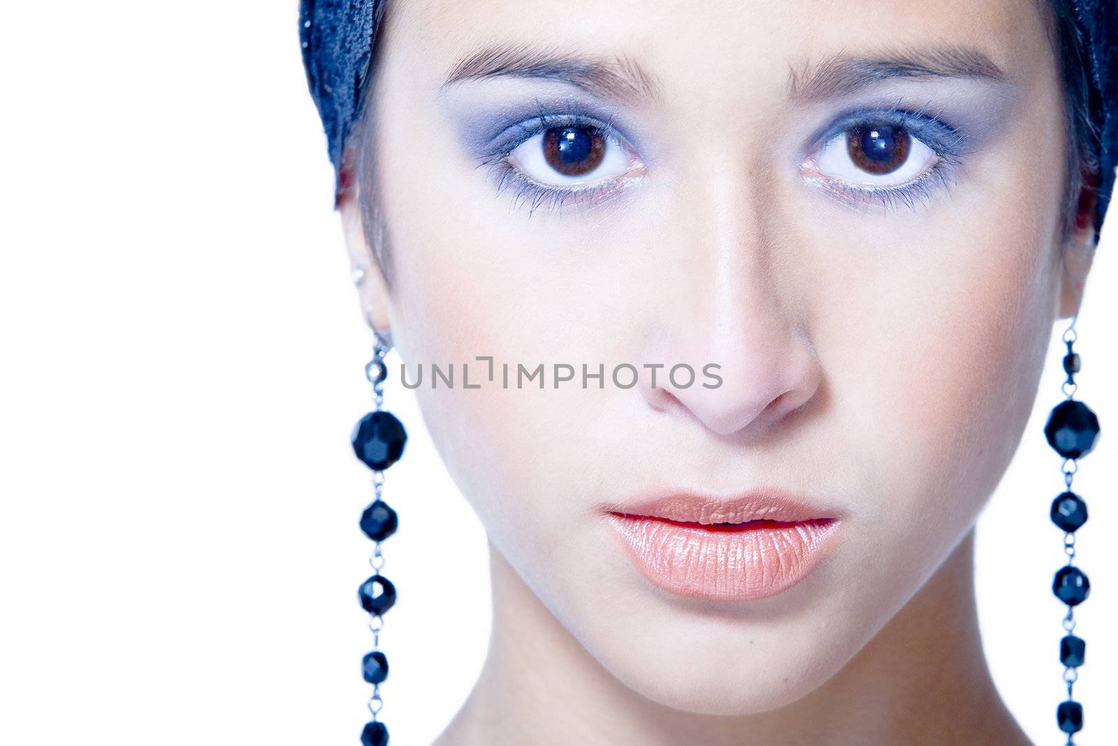 Studio portrait of a beautiful mixed race, vietnamese girl with earrings