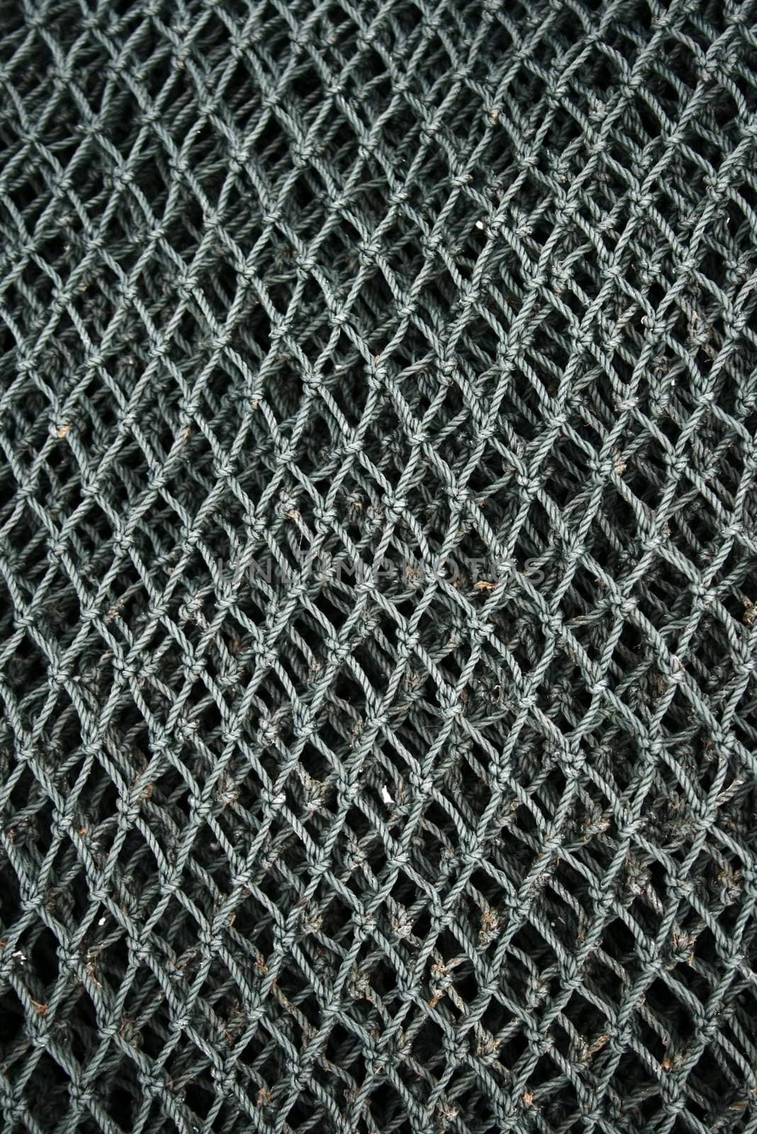 Close up of fishing net found in a fishing village.