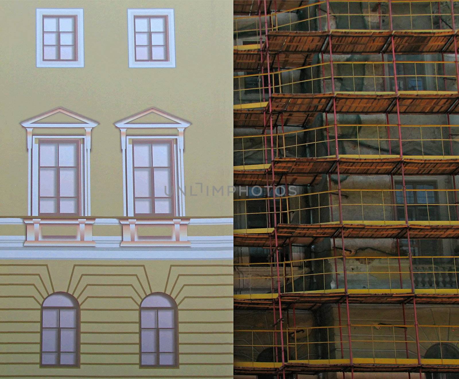 The scaffolding and the false front of a house under reconstruction