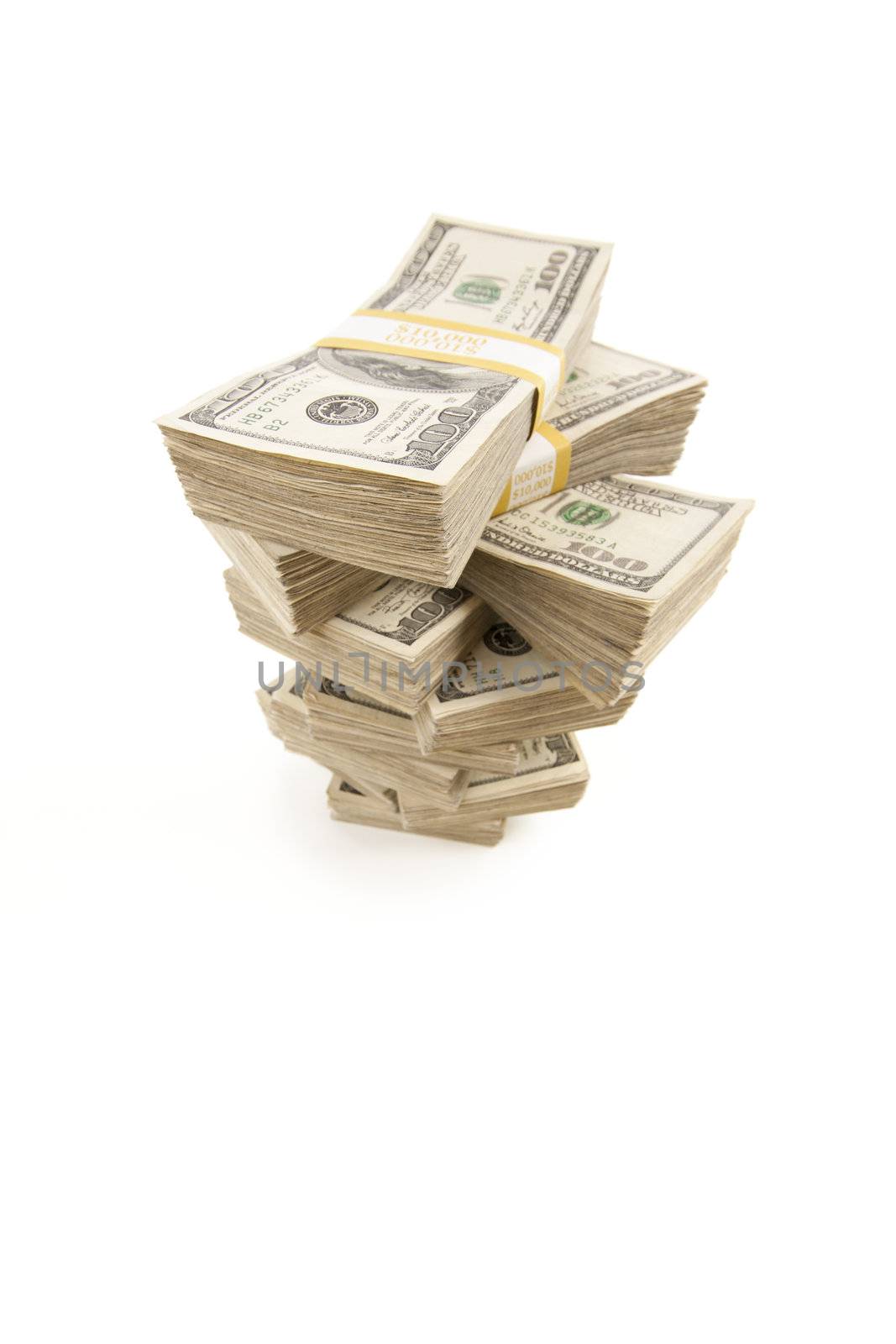 Stacks of One Hundred Dollar Bills Isolated on a White Background.