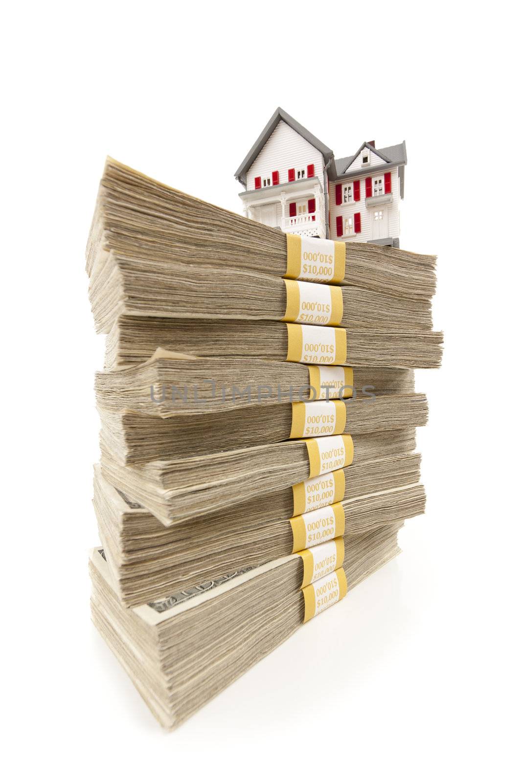 Small House on Stacks of Hundred Dollar Bills by Feverpitched