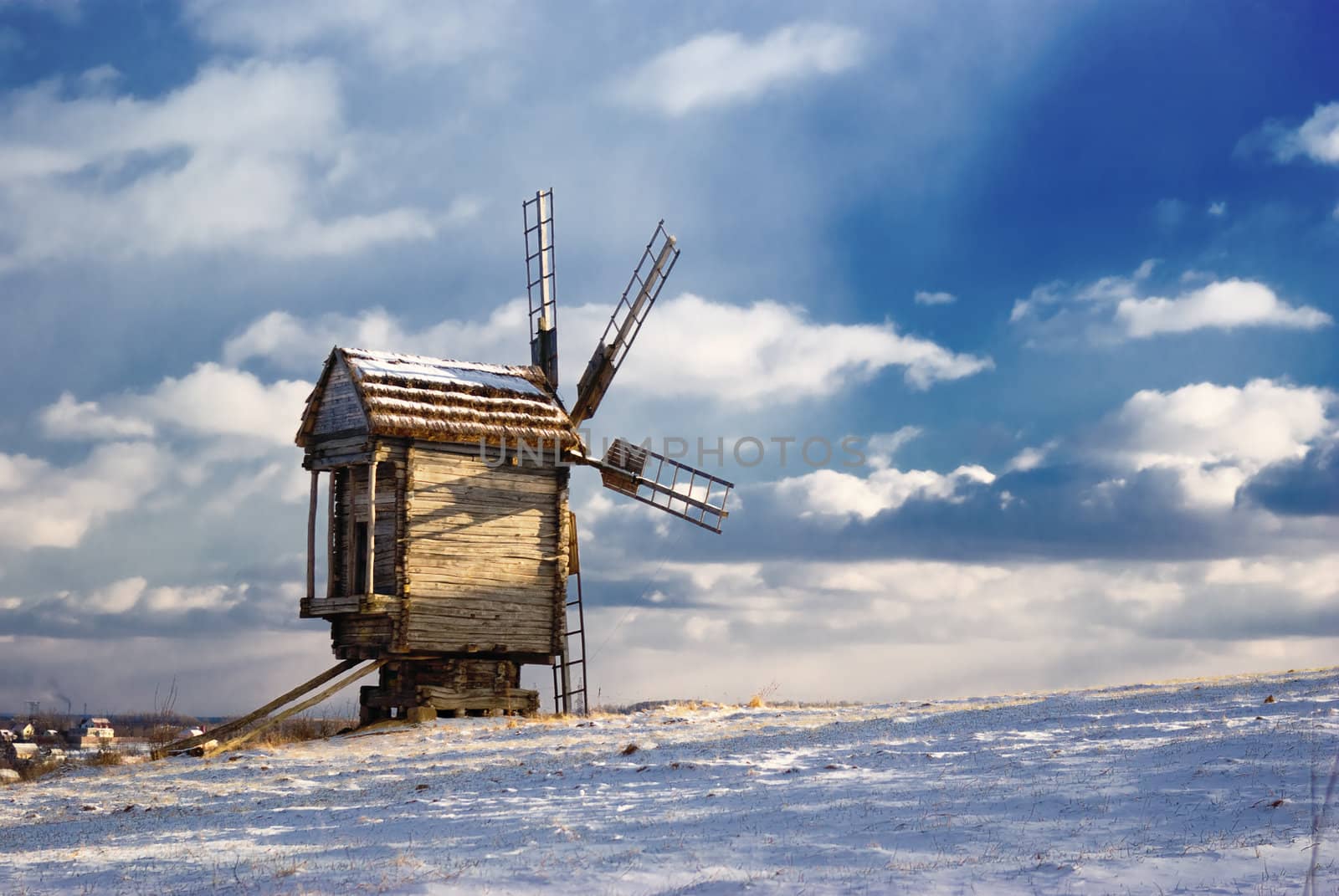 Old wooden windmills at Pirogovo ethnographic museum, near Kiev, Ukraine 

