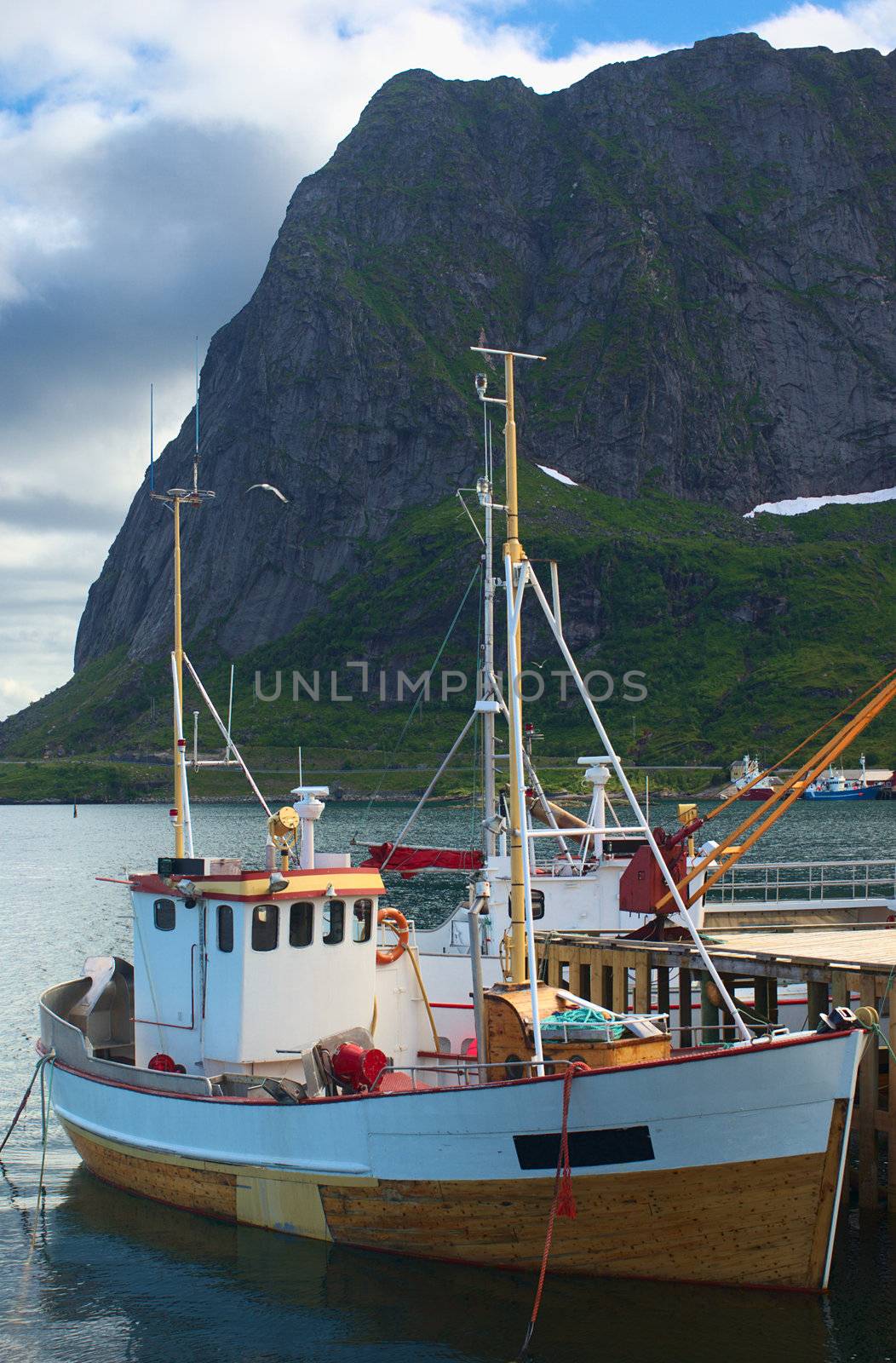 A two-master fishing boat (dogger) anchoring in Reine on Moskenesoya, Lofoten, Norway 