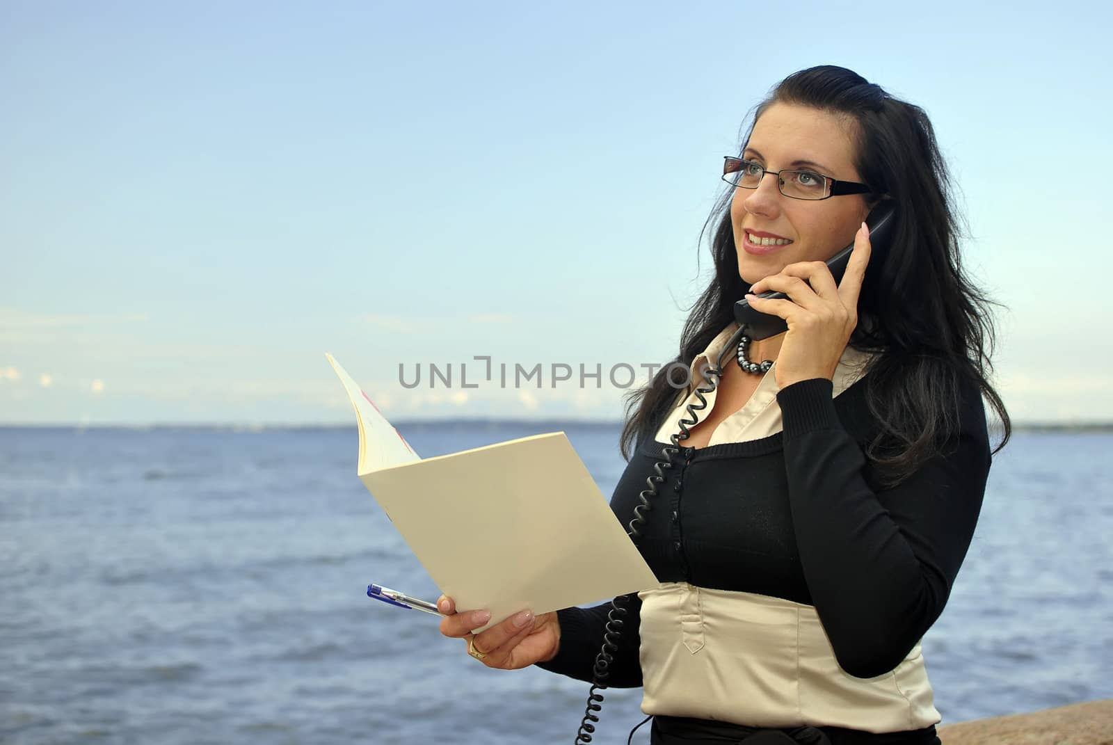 girl with a telephone receiver in hand, space for text