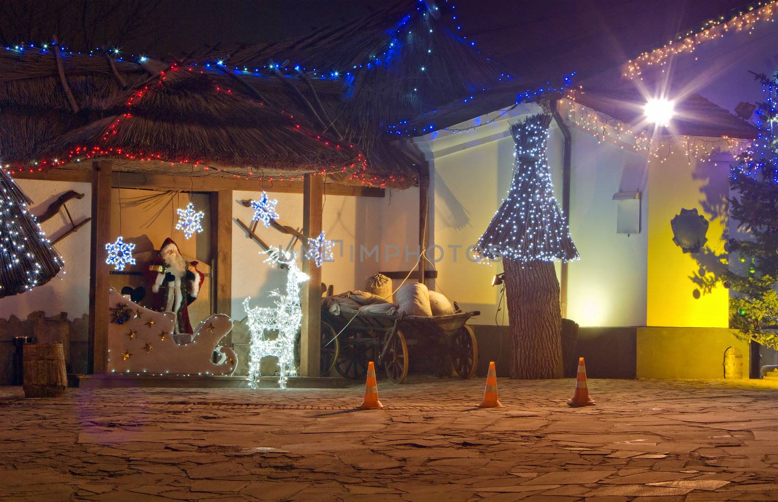 building decorated with Christmas lights in the evening
