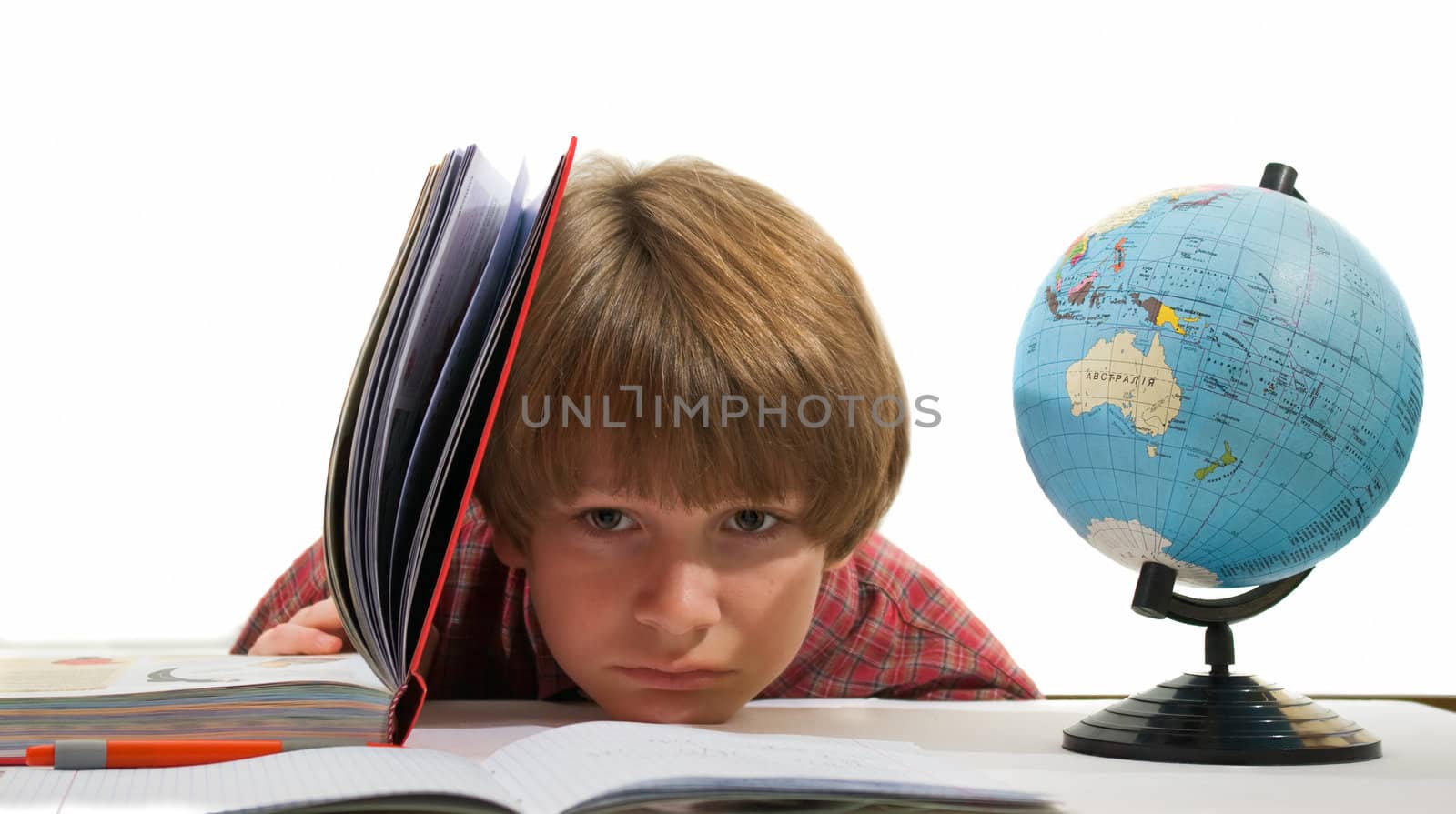 a young boy with the globe on a white background