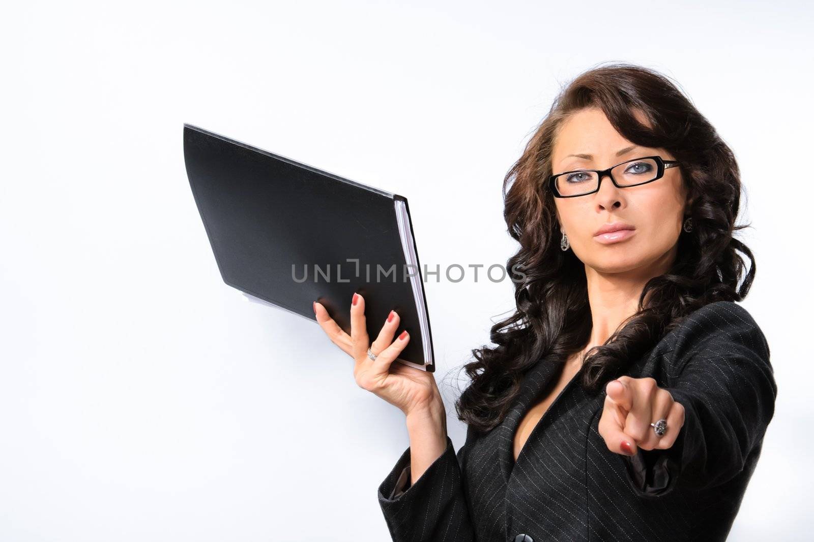 A young beautiful business woman pointing her finger