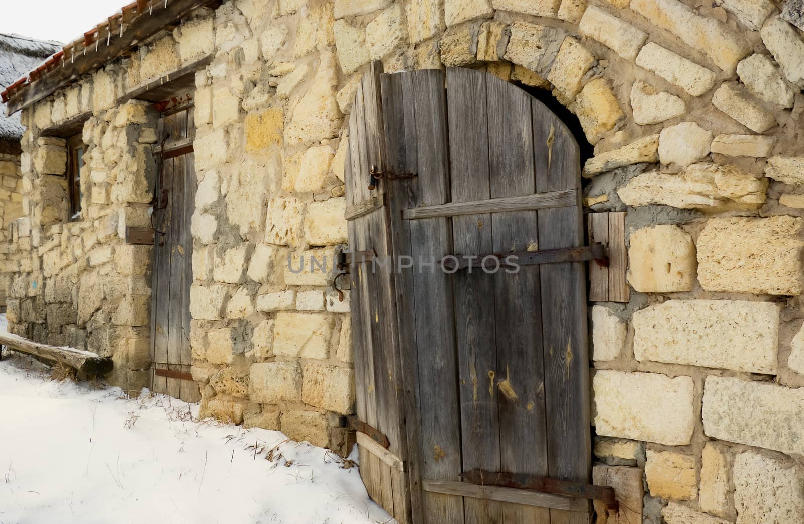 Authentic vintage wooden door on original log cabin