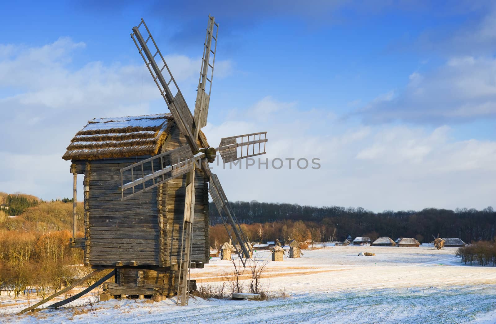 Old wooden windmills at Pirogovo ethnographic museum, near Kiev, Ukraine 