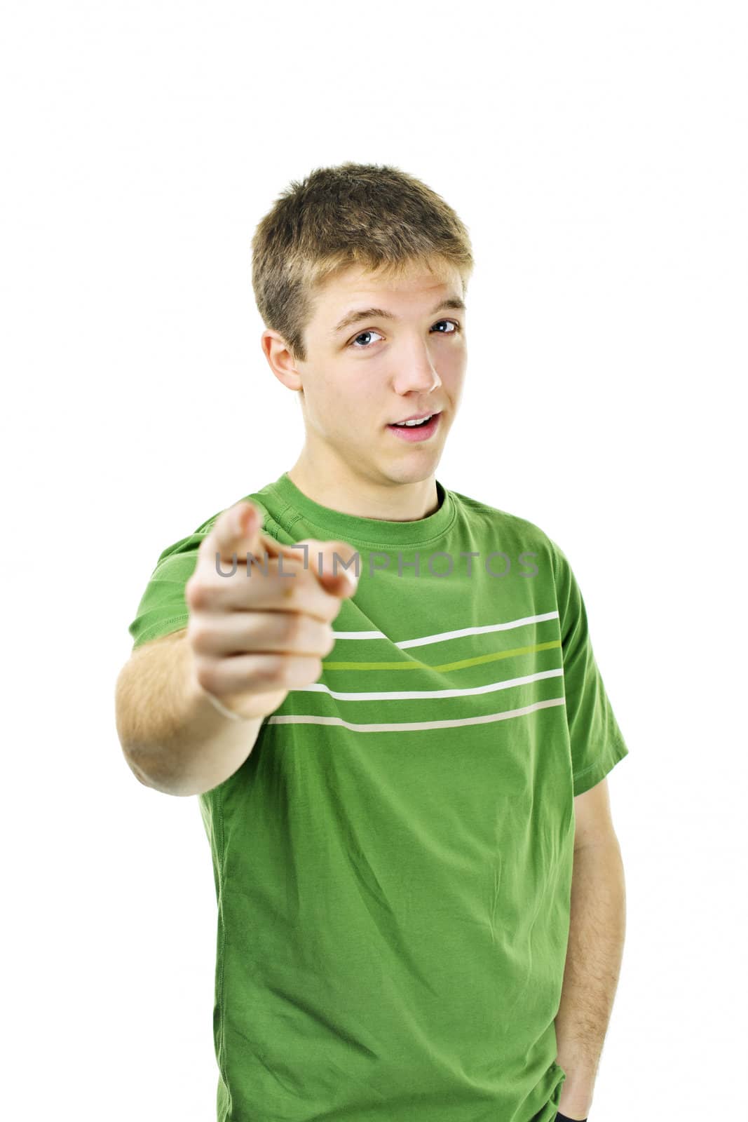 Serious young man pointing finger at camera isolated on white background