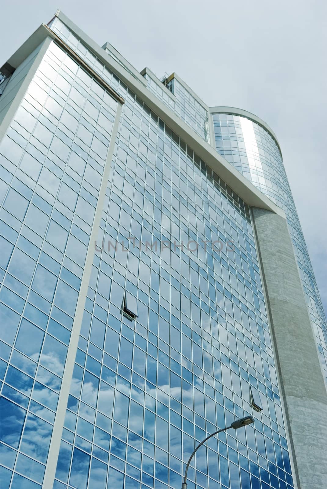 clouds reflected in the windows of the building