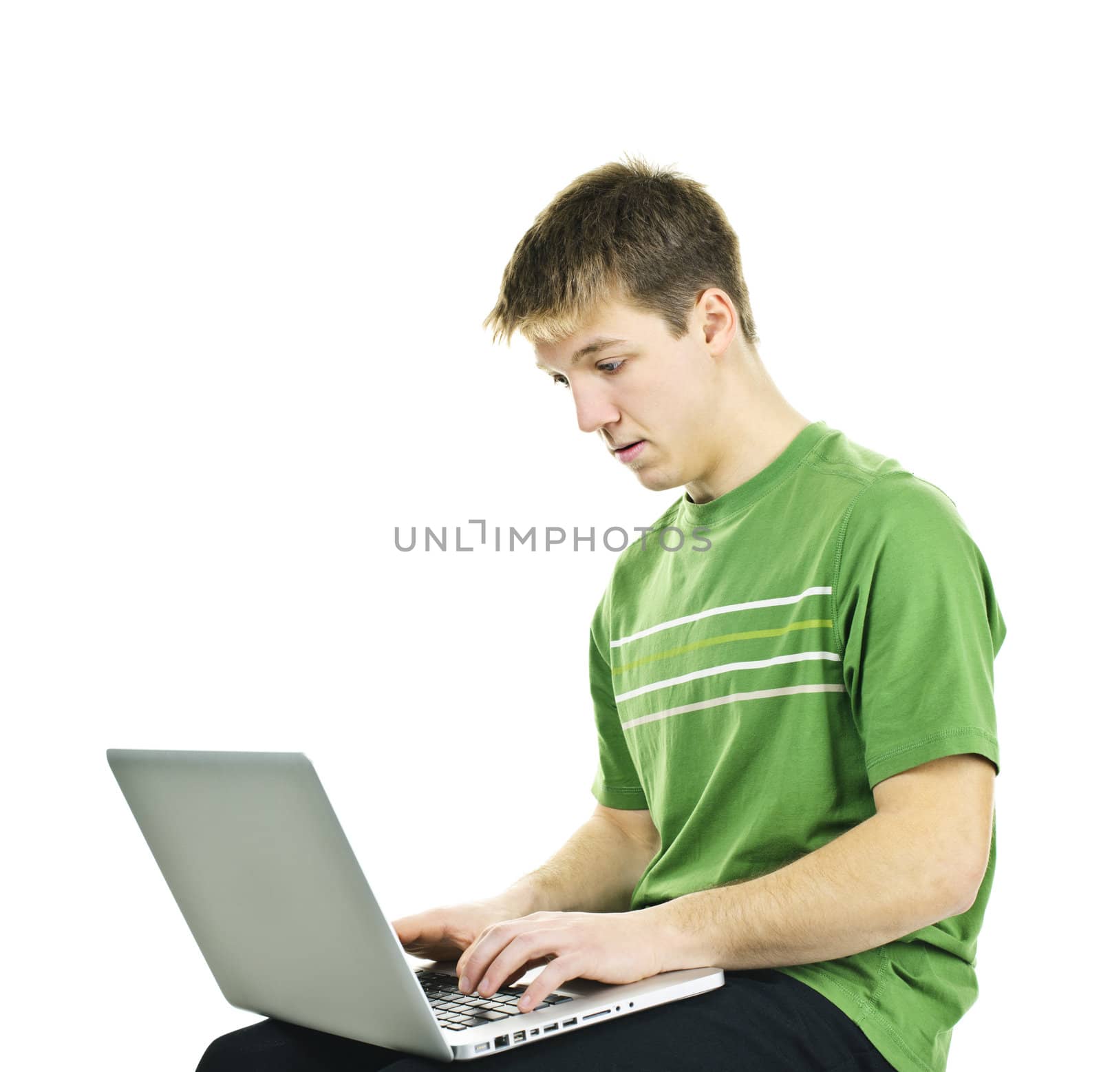 Young man with laptop computer by elenathewise