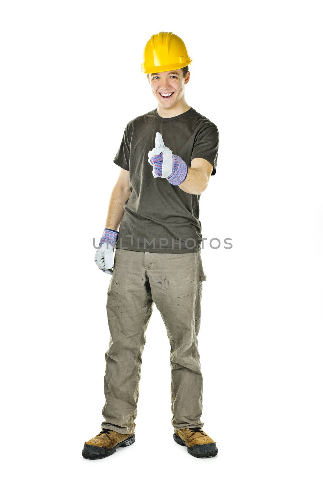 Smiling construction worker showing thumbs up isolated on white background