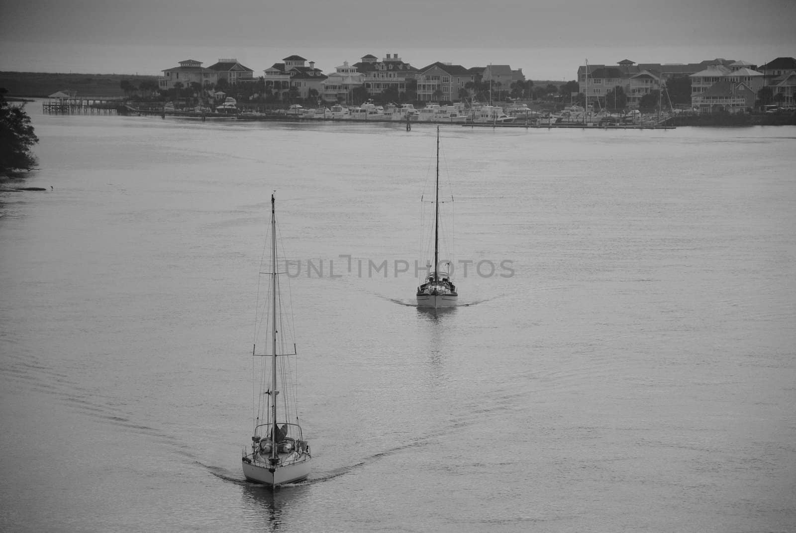 Two ships heading out for the day along the intercoastal waterway