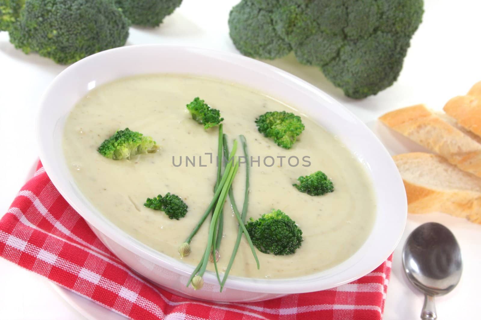 broccoli cream soup with fresh broccoli and chives