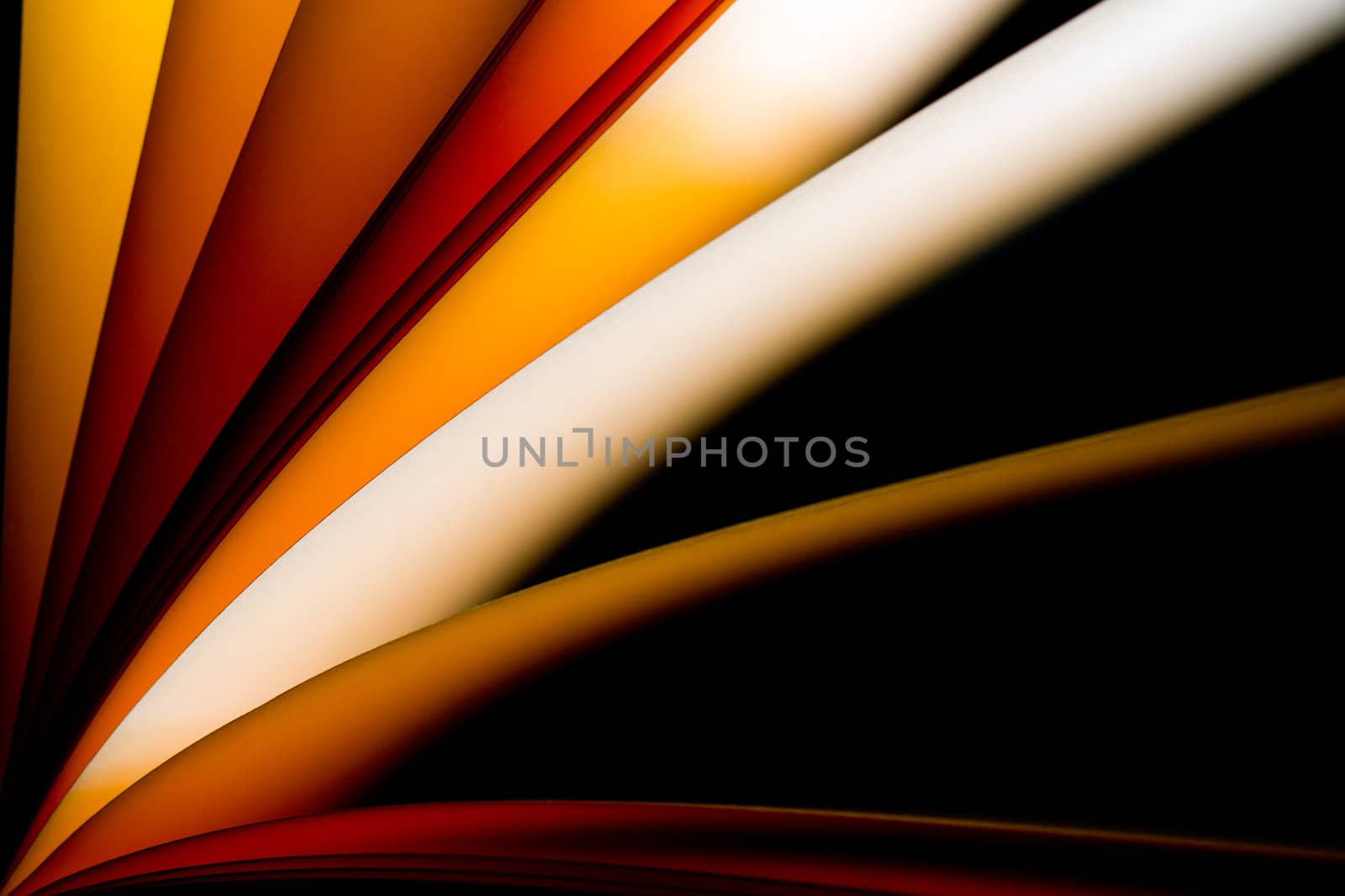 brown notepad paper illuminated by LED lights in landscape orientation with paper from left lower angle