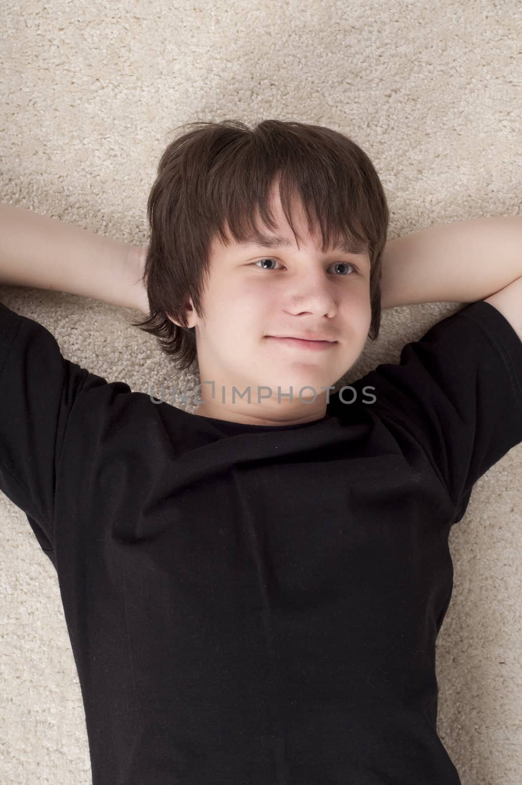 young guy lying dreams about future time