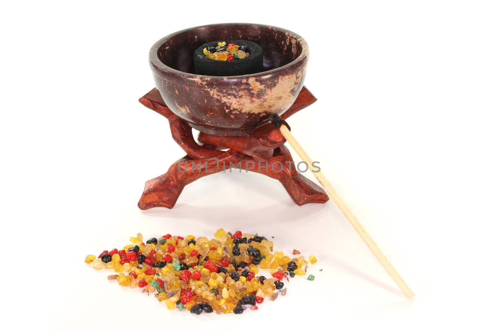 colorful frankincense with incense censer on a white background