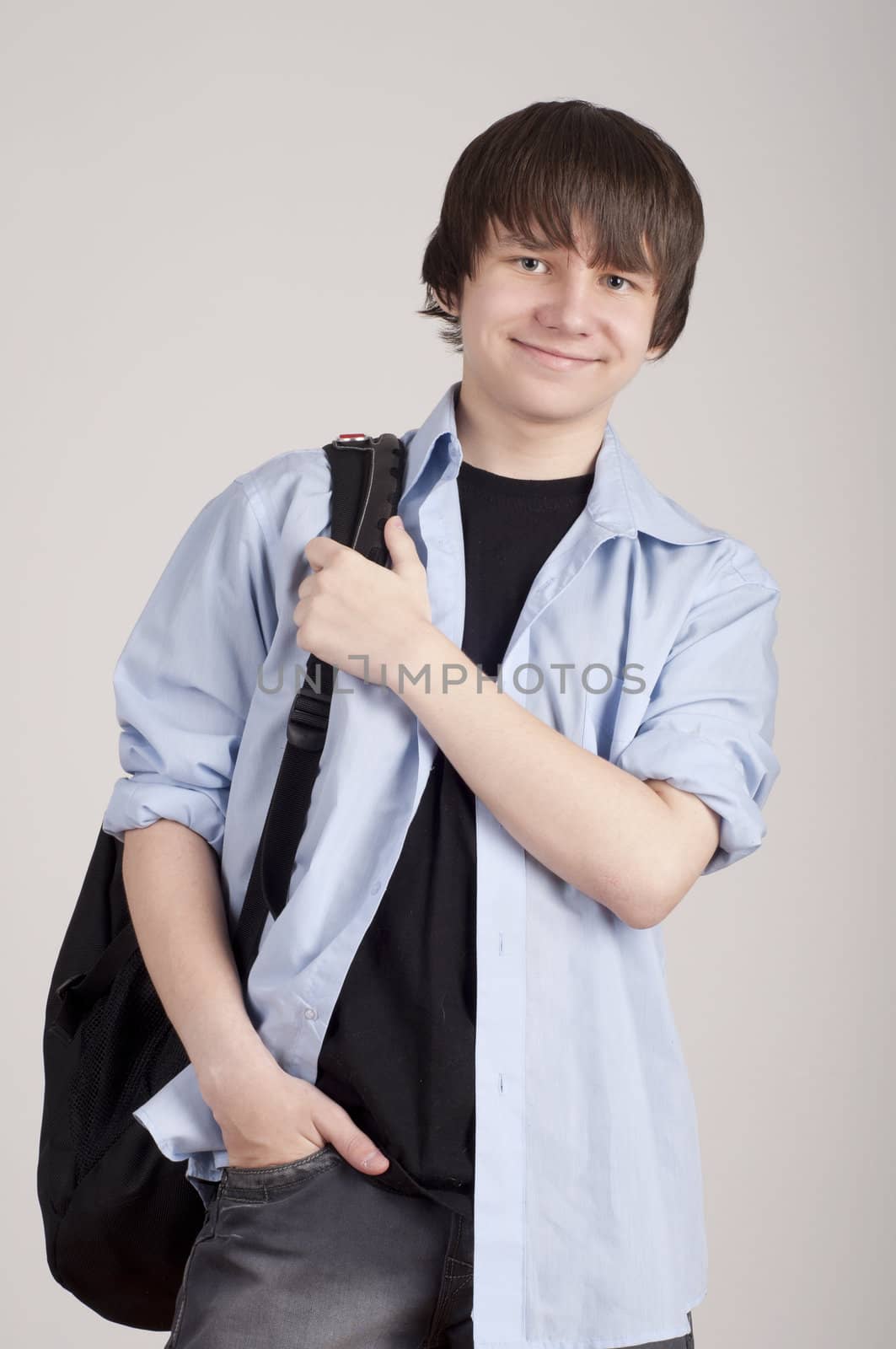 Stock image of university student, gray background