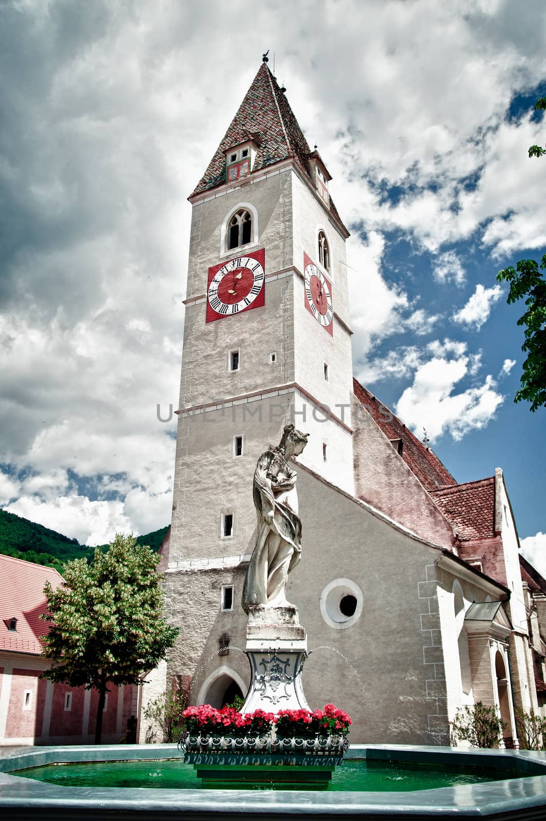 Church of Spitz in Lower Austrie with dramatic Cloudscape