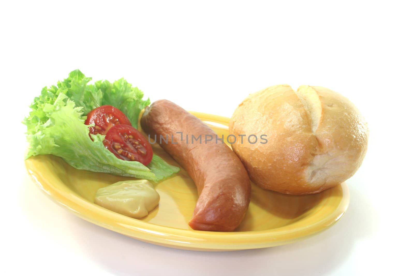 Frankfurter sausages with bread and salad on a white background