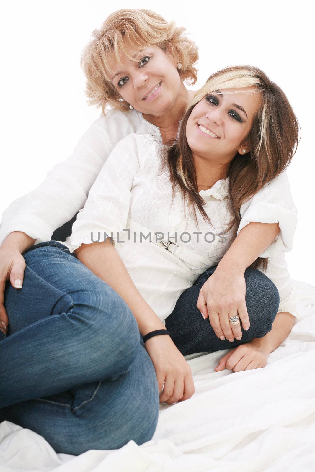 image of a mother and daughter happily together sitting on the floor